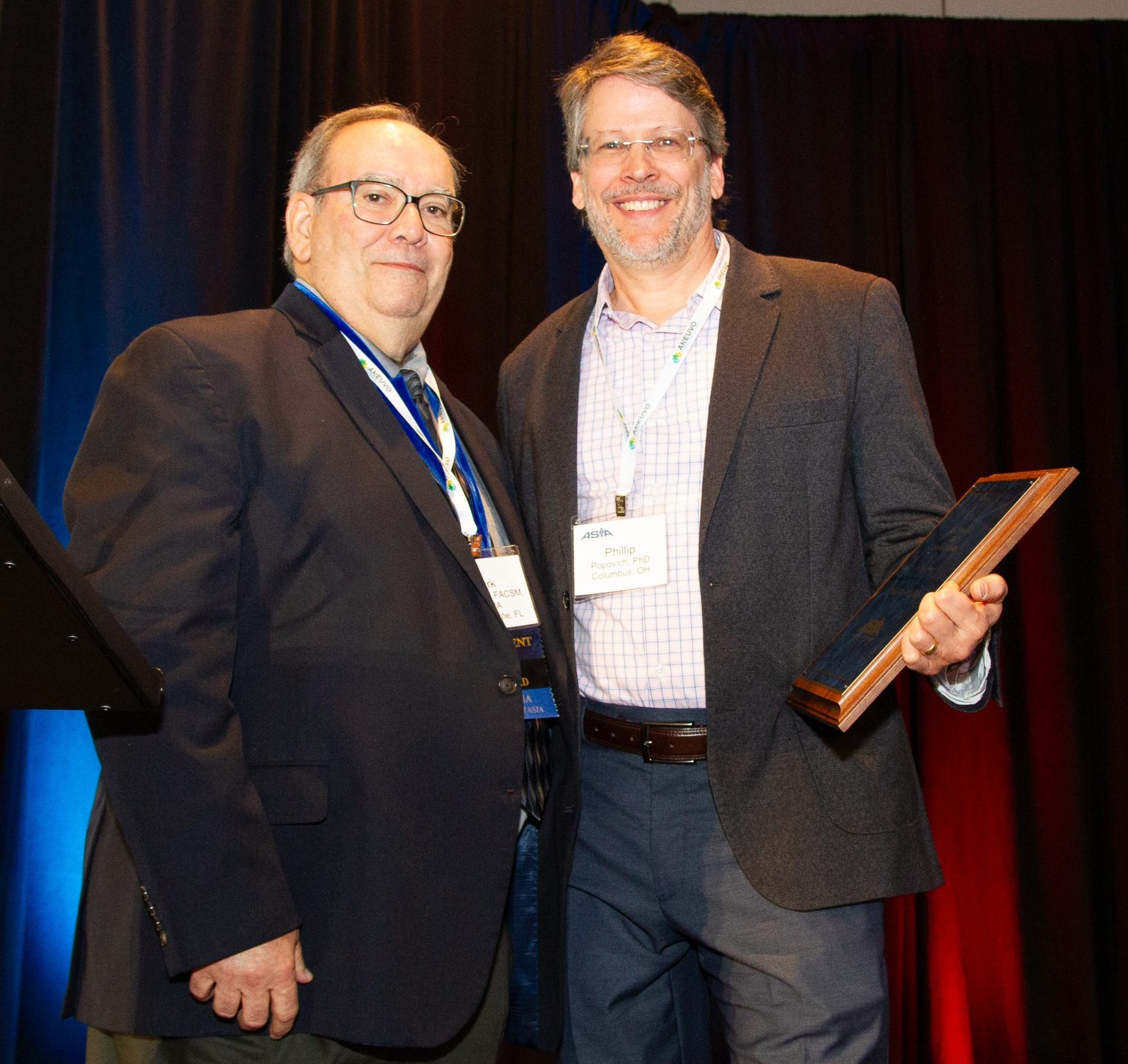 Photo of Mark Nash, PhD, FASIA, and  Phillip Popovich, PhD